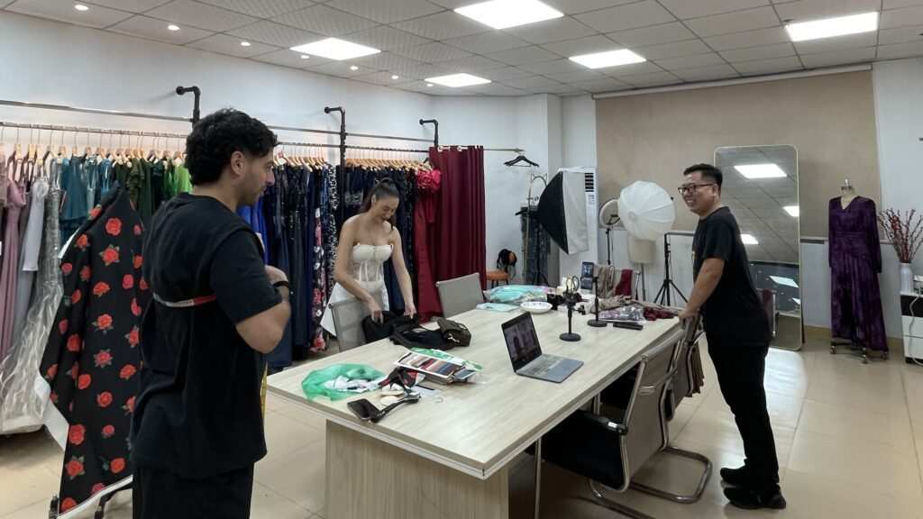 V7proX sourcing agent guiding international buyers through a factory design meeting China business trip.