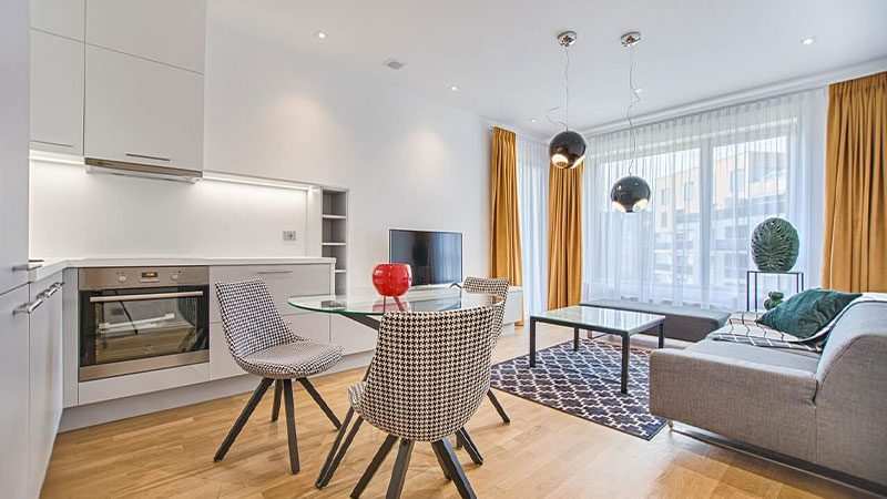 two chairs with glass table on living room.jpg