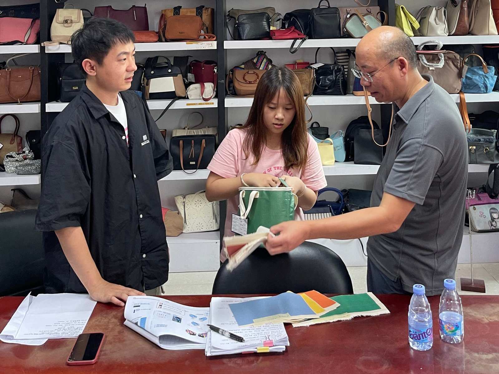 Factory worker creating pre-production samples in China manufacturing facility