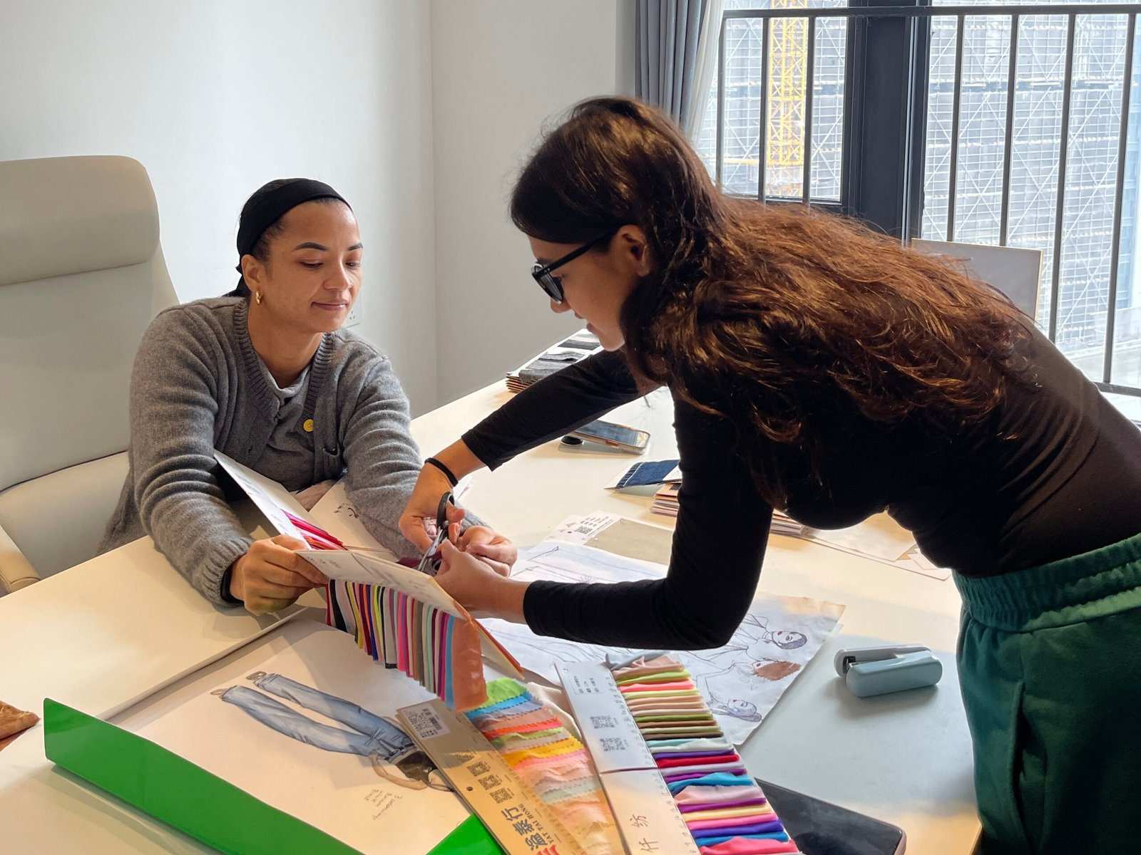 Reviewing technical specifications and tech packs for custom product prototyping