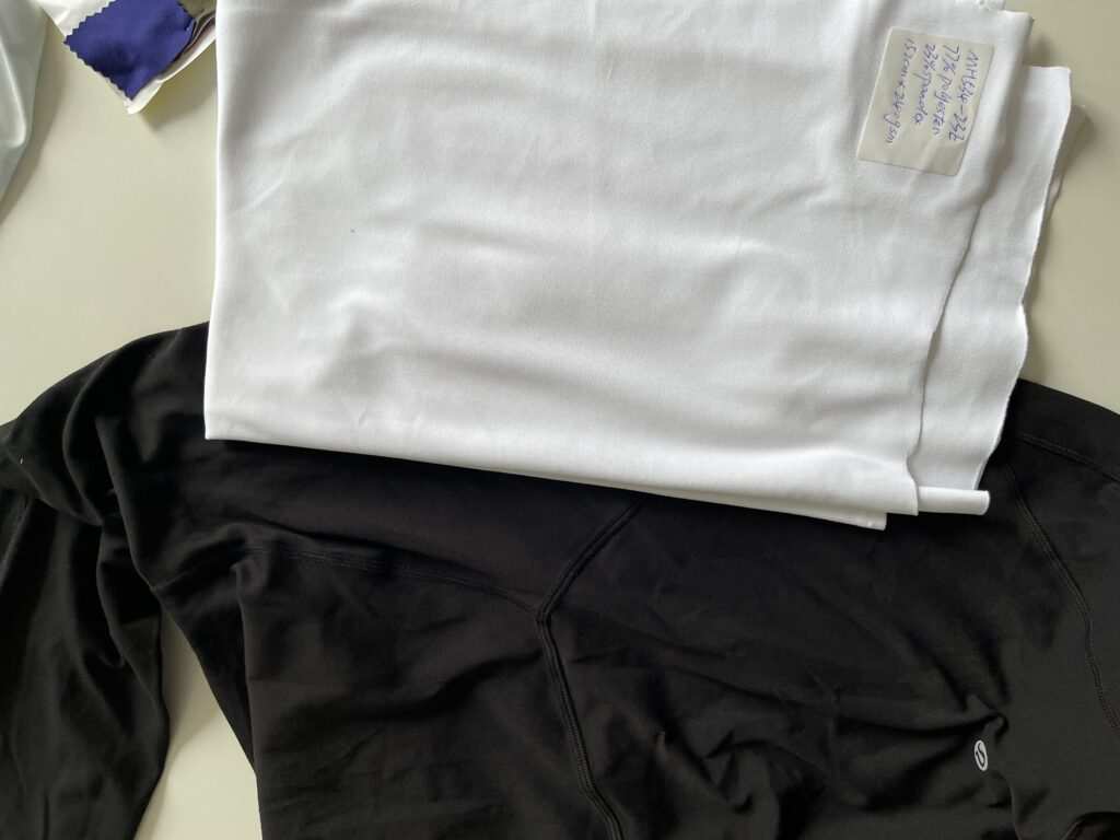 Checking elasticity of seamless activewear from low MOQ clothing manufacturers for TikTok brands to ensure squat proof quality