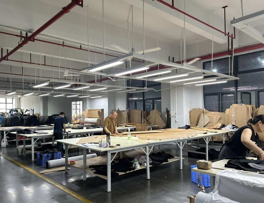 V7proX team performing furniture quality inspection in factory