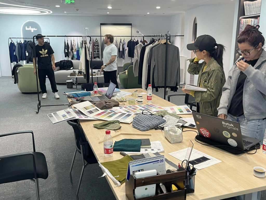 V7proX expert reviewing strict apparel tech pack requirements and BOM details